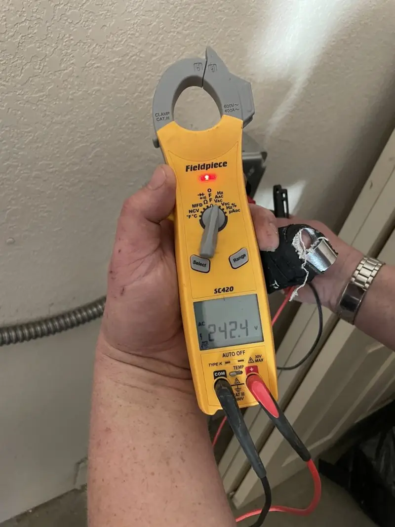 Voltage testing with clamp meter during Circuit Breaker Repair in Lower Salford